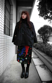簑衣下的花朵
