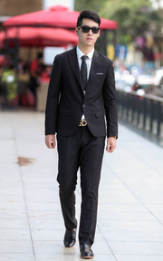 THE ART OF WEARING A BLACK SUIT