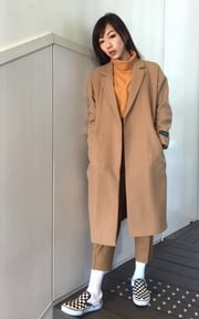 駝色人