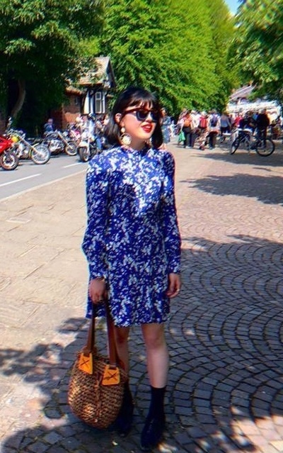 Having my outfit photo taken by him by River Dee. 