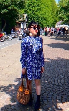 Having my outfit photo taken by him by River Dee. 